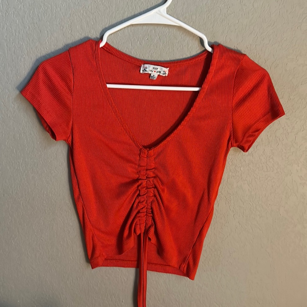 Woman’s size small red top